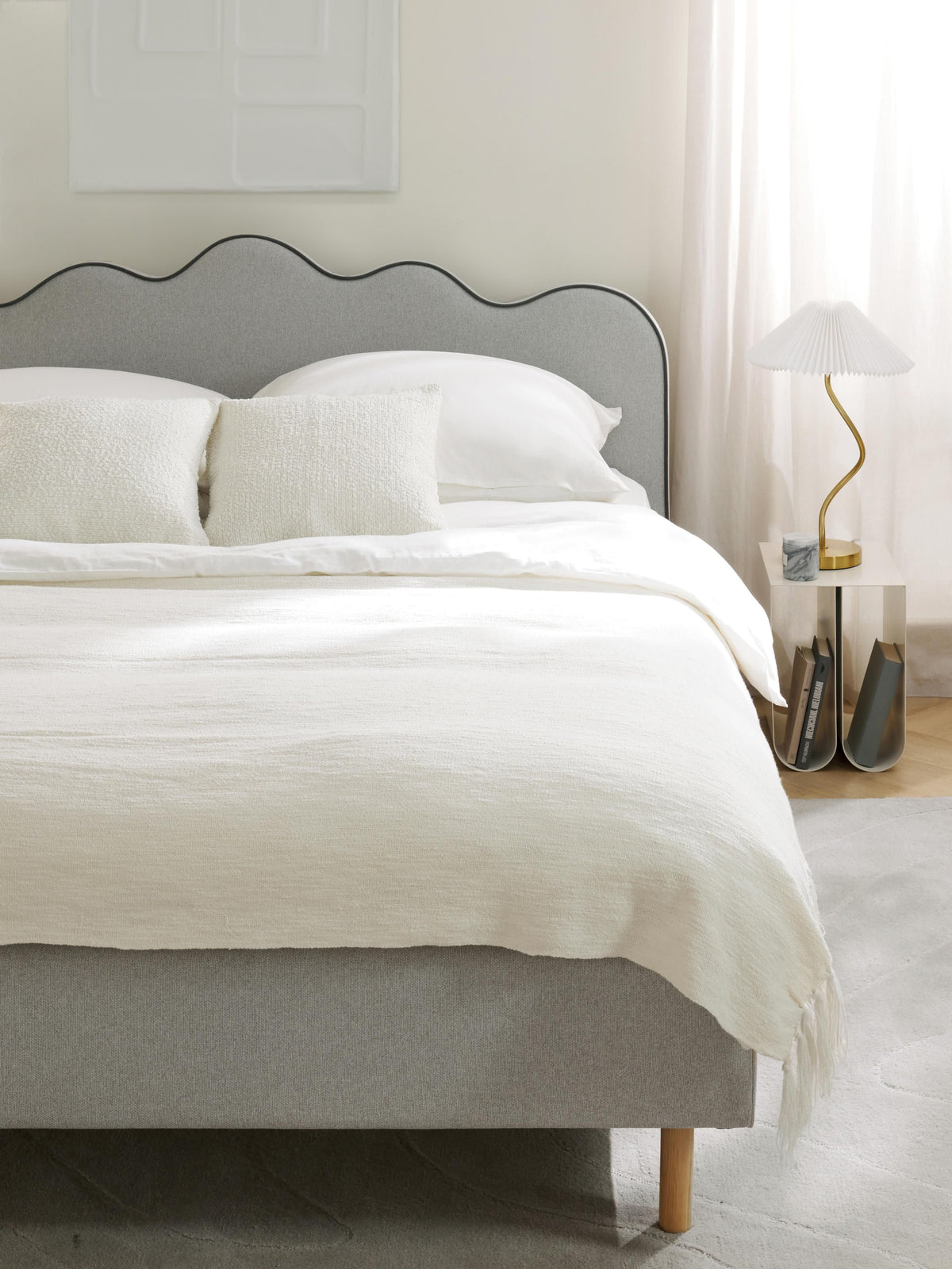 Romyra Upholstered Bed with Wavy Headboard